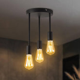 Ceiling light fixture with three lit bulbs on a neutral background